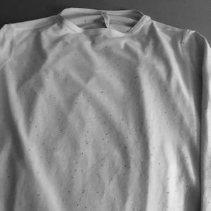 LA Back in Action long sleeve top. White with multi colored specs.